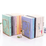 Buchstützen Spiralen